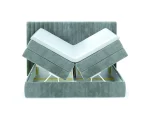 Boxspring-Doppelbett mit Bettkasten MINOLA – Bettkasten geöffnet, auf weißem Hintergrund